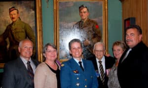 Bent family at the Annual Officer’s Mess Dinner of the 48th Highlanders in front of the painting of Lt 
      Col CE Bent. Granddaughter Carol O’Neill 2nd from right. Son Donald Bent 3rd from right.