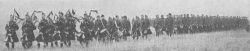 Battalion parading at Salisbury 1914. LCol JA Currie visible to rear of band and at the head of the column. Pipe Major Alexander Keith front left