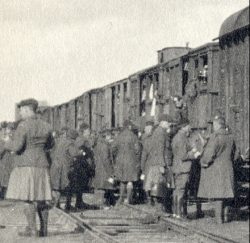 Entraining in Nazaire, France after crossing the channel. Feb 1915.