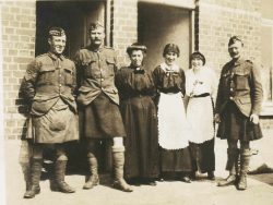 Three No 4 Company Sgts and local
French villagers. L-R: Sgt H. Ashling, J. Thompson (KIA Festubert) and E.
Rodgers. POWs at Ypres. Location
unknown. Feb-Mar 1915
