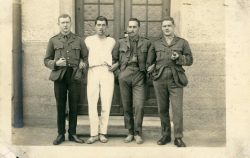 Canadian POW officers. L-R: Lt MacDonald, Lt Ryder (Buffs), Lt Fessenden, Lt Smith. All captured at 2nd Ypres 24 April 1915. Bischofswerda POW camp, Hannover, Germany. Undated.