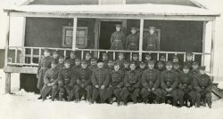 Camp staff with Lt Geoffrey Heighington and an
unidentified Officer both of the 48th Highlanders in centre. Kapuskasing detention centre
Dec 1915. 48th Highlanders provided personnel as part of the guard detail.