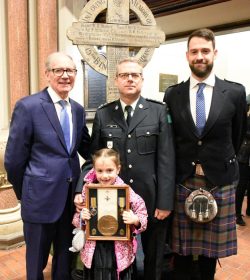 The Merritt family of Niagara-on-the-Lake, On,
descendants of Private Orlando, in front of which bears his
name at St. Andrew’s Church in Toronto during the cross’-repatriation service
in April 2018.