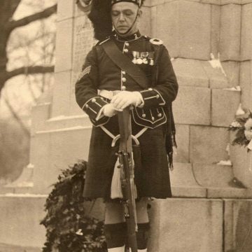 Sergeant Henry Ralph, a 15th Battalion veteran, as a sentry in the 1920's at the Regimental memorial